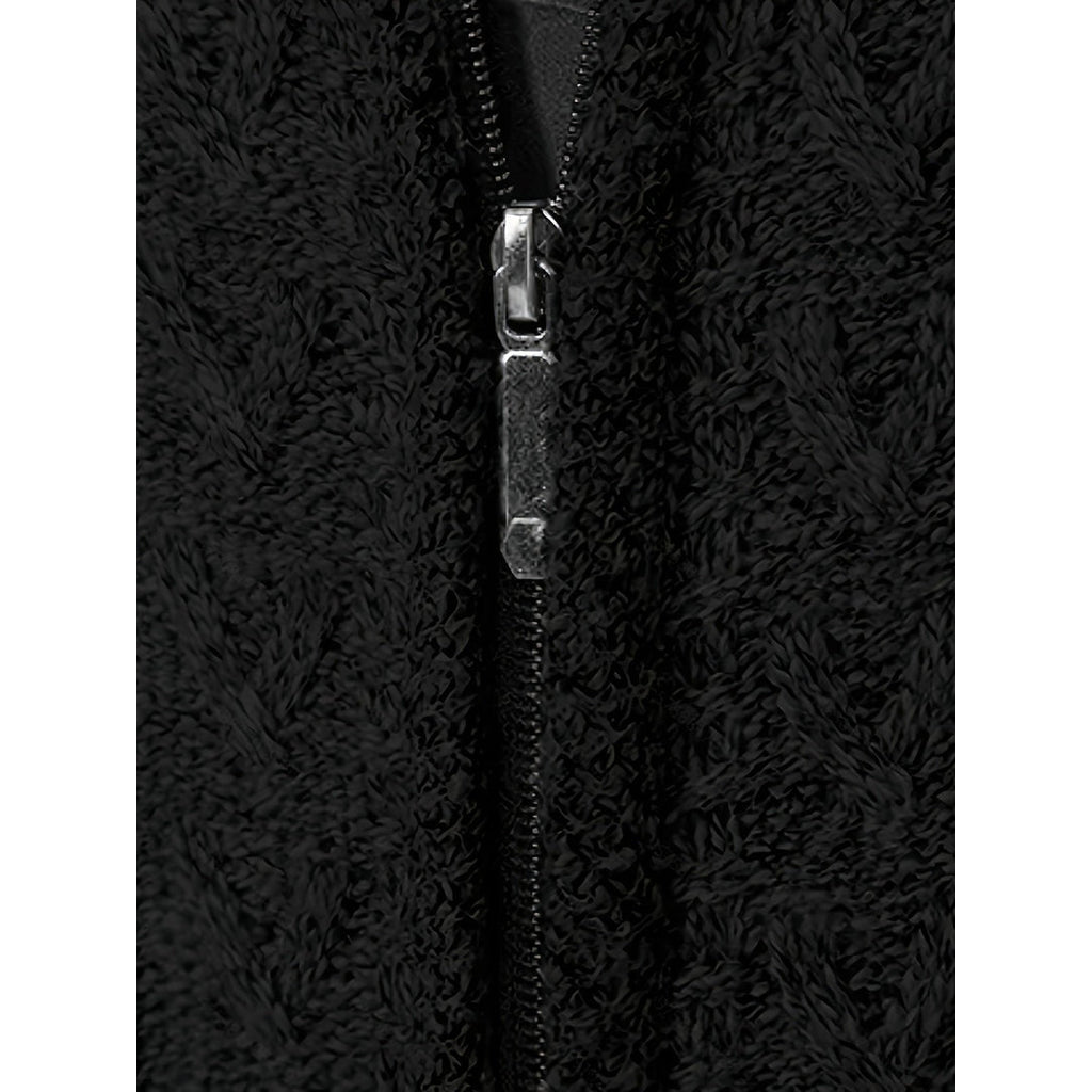 Close-up of the zip and cable knit