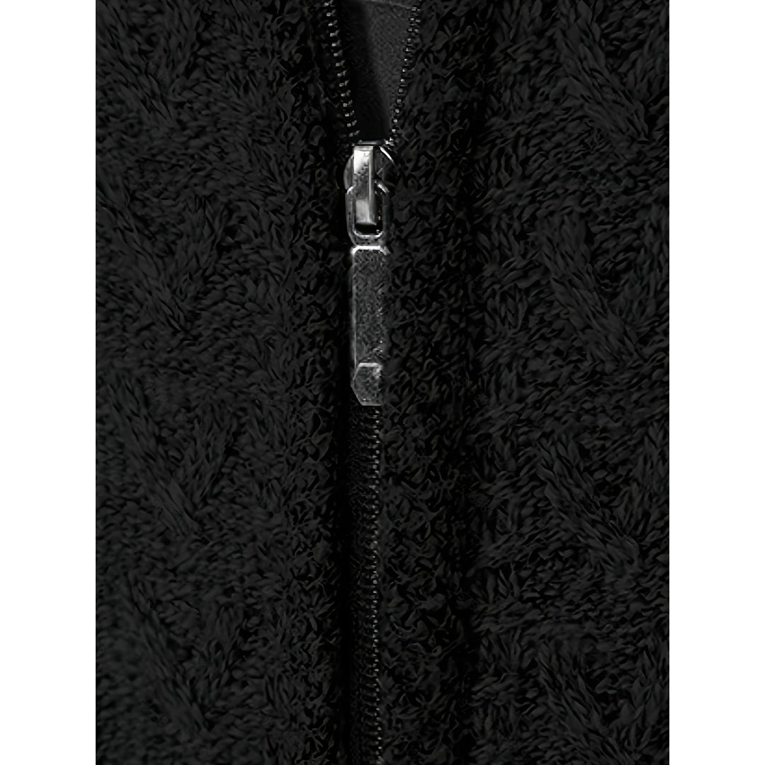 Close-up of the zip and cable knit