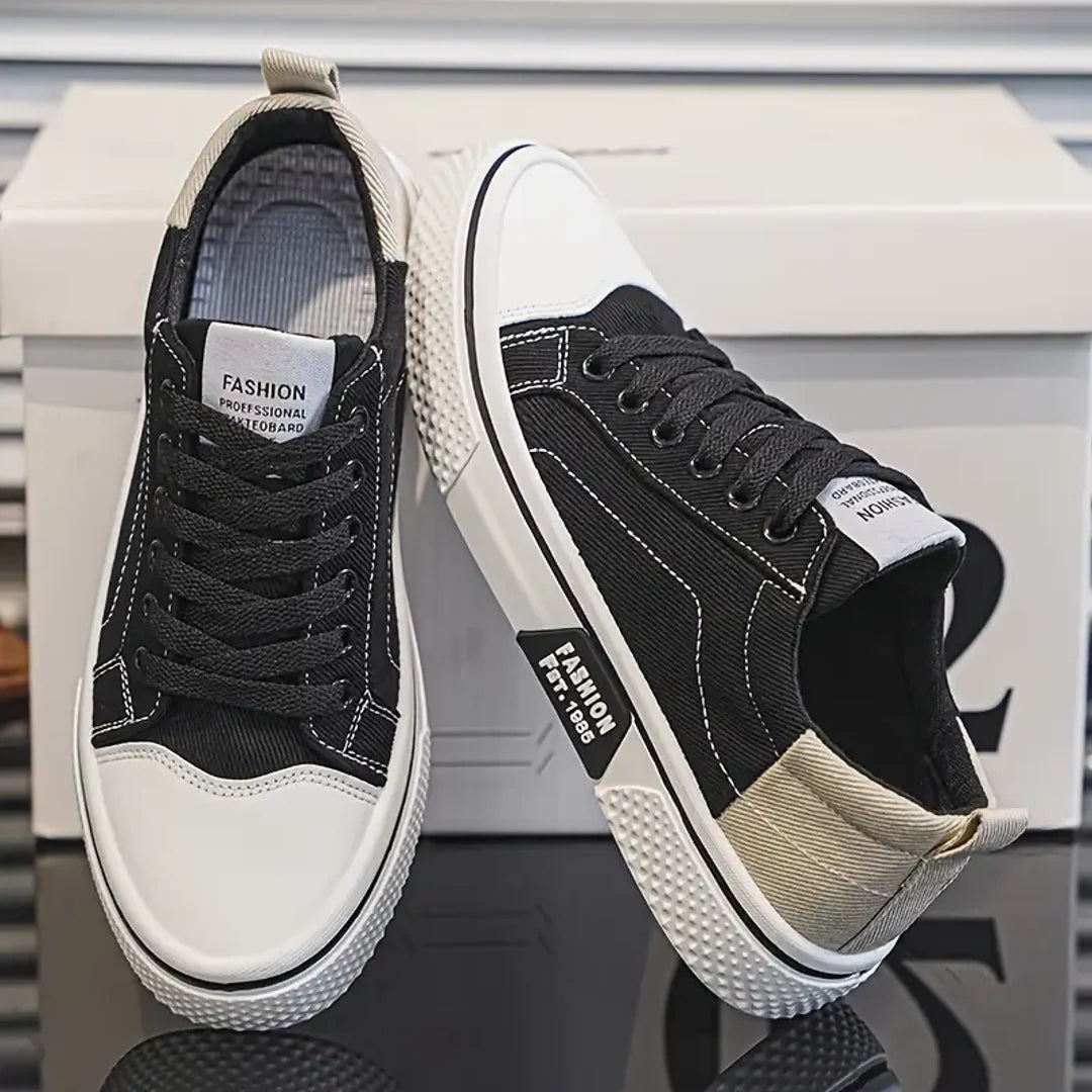 Men's black canvas sneakers with white toe cap