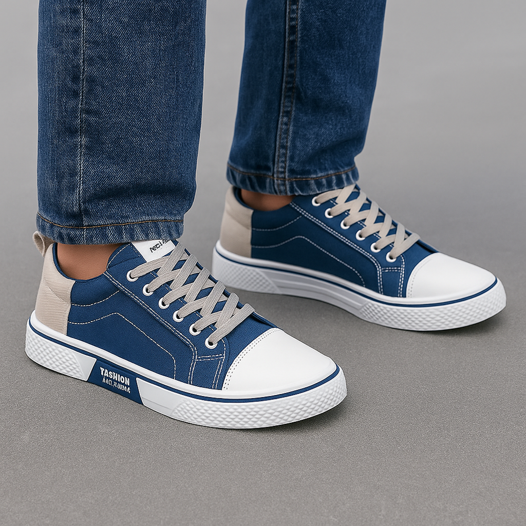 Man wearing blue canvas sneakers with jeans