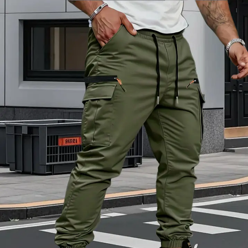 Man wearing green cargo joggers with drawstring waist