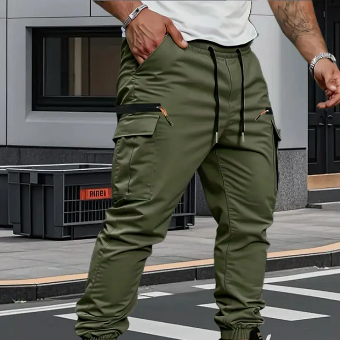 Man wearing green cargo joggers with drawstring waist