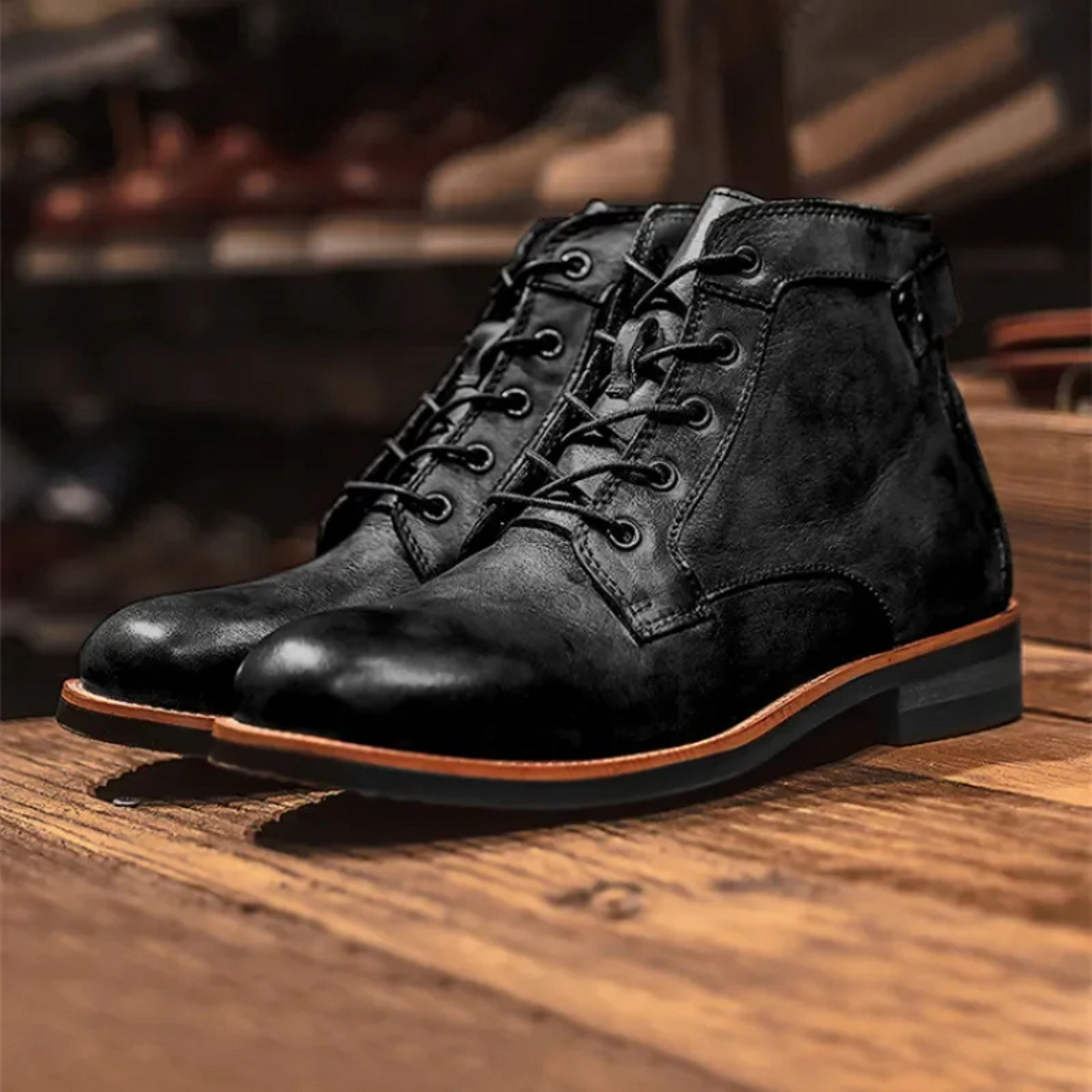 Men's black lace-up ankle boots on a wooden shelf