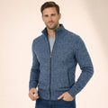 Man wearing a blue full-zip knit cardigan
