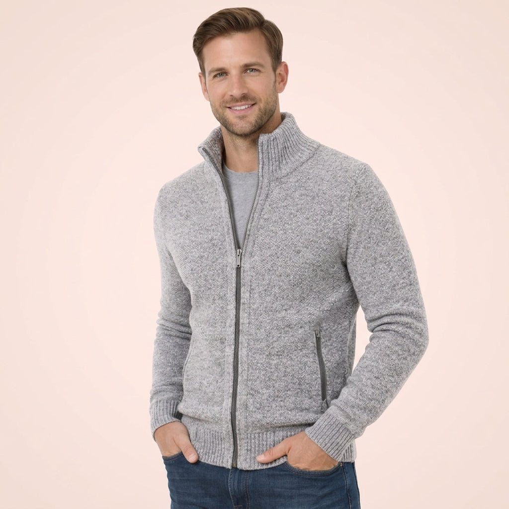 Man wearing a grey full-zip knit cardigan