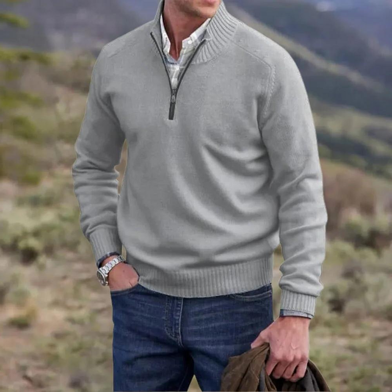 Man wearing the half-zip knit sweater outdoors