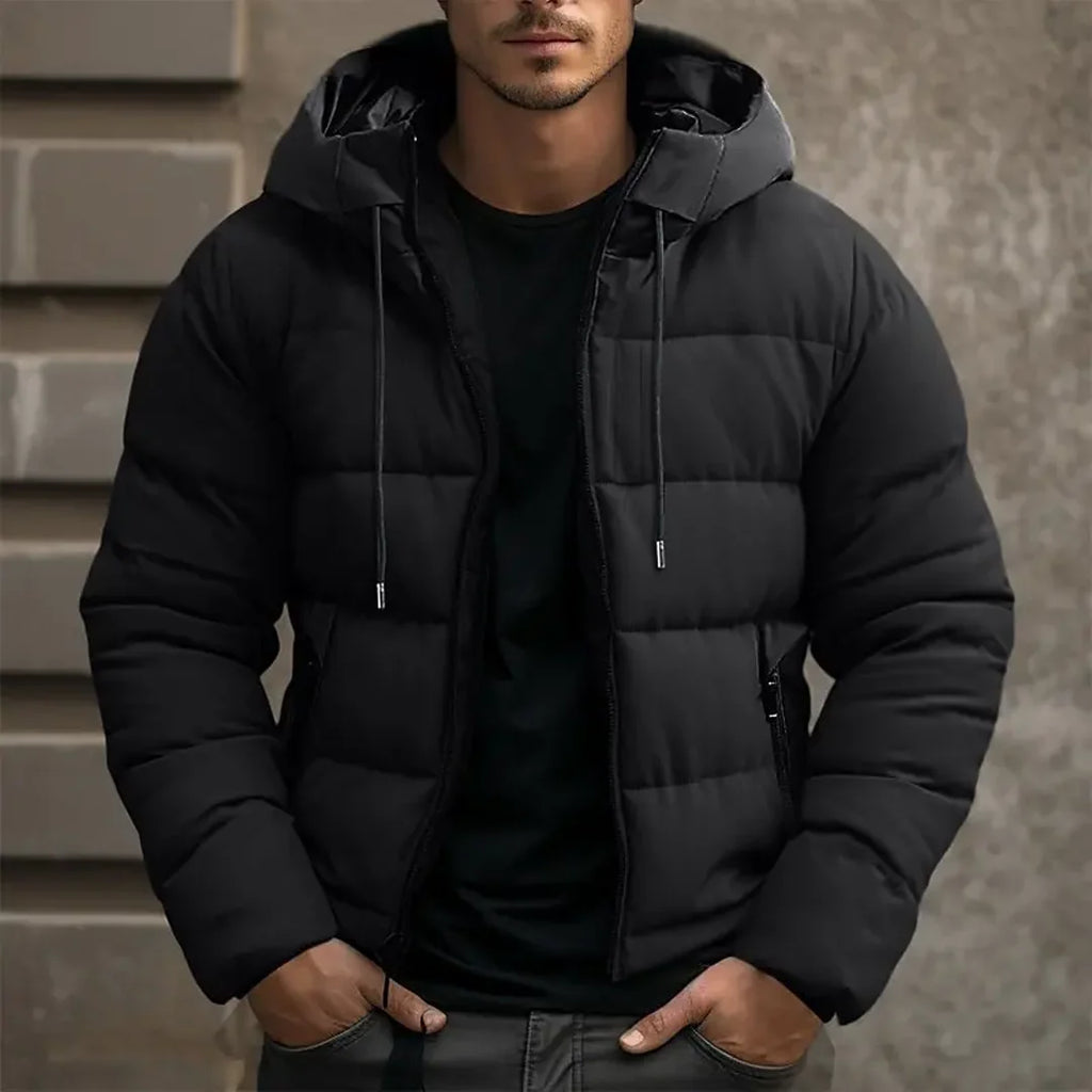 Man wearing a black hooded puffer jacket