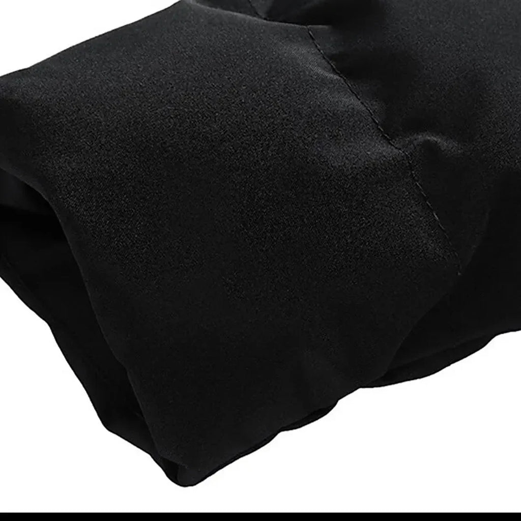 Close-up of the black puffer jacket cuff