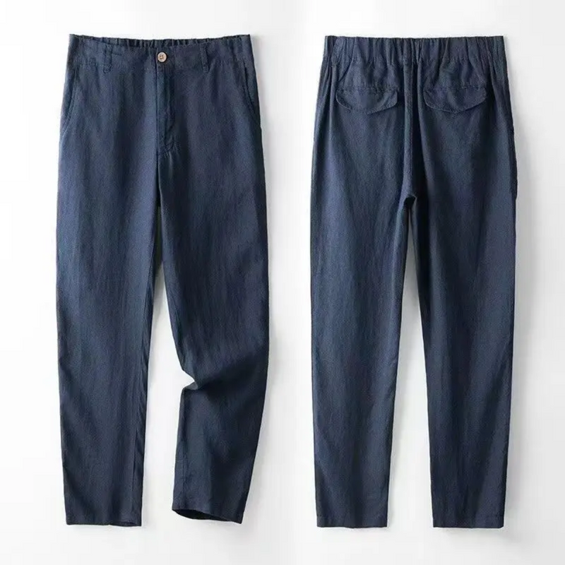 Dark blue trousers – flat lay