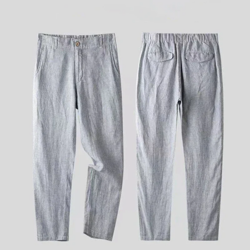 Grey trousers – flat lay