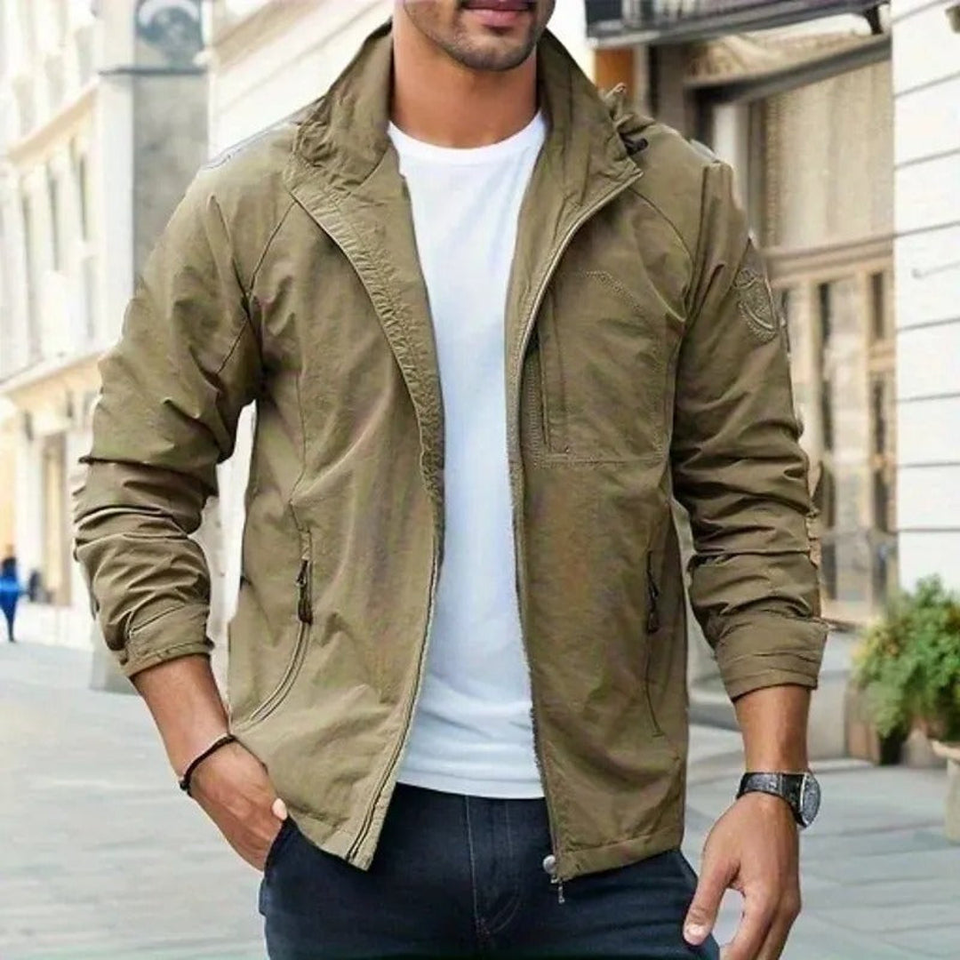 Man wearing a khaki hooded cargo jacket