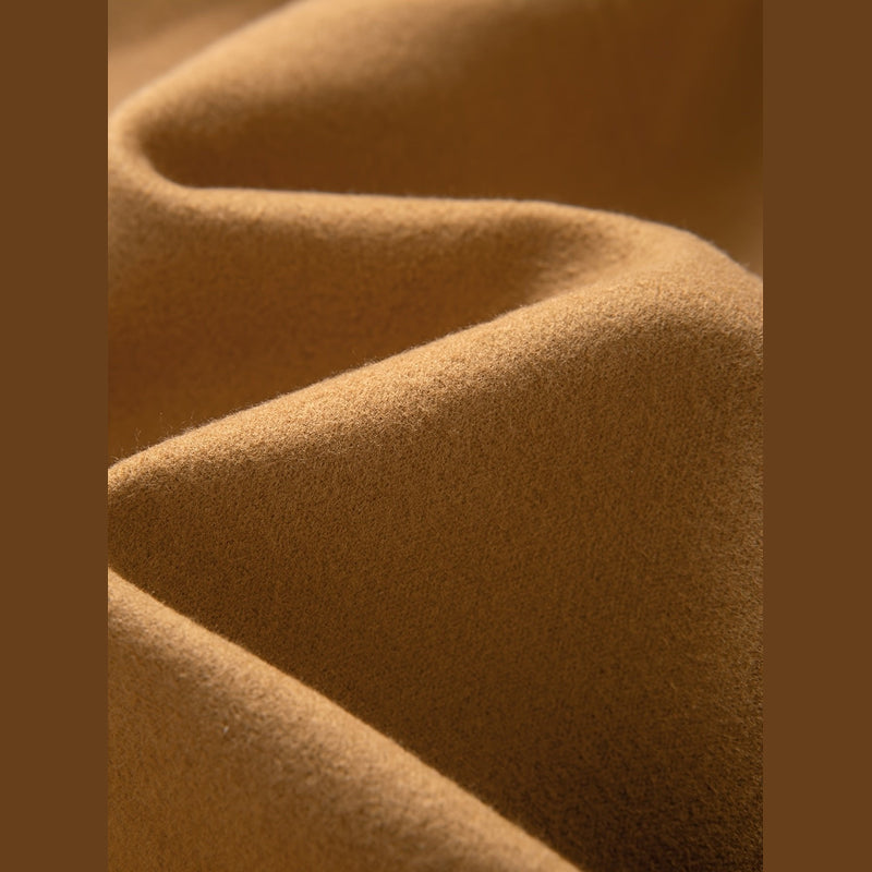 Close-up of the brown overcoat fabric texture