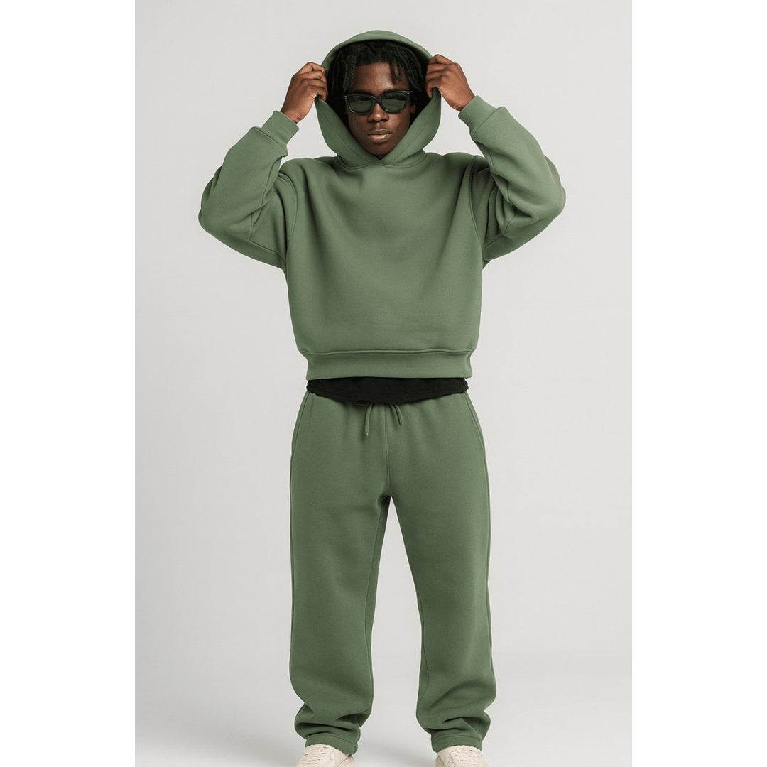 Man wearing an army green hoodie and jogger set