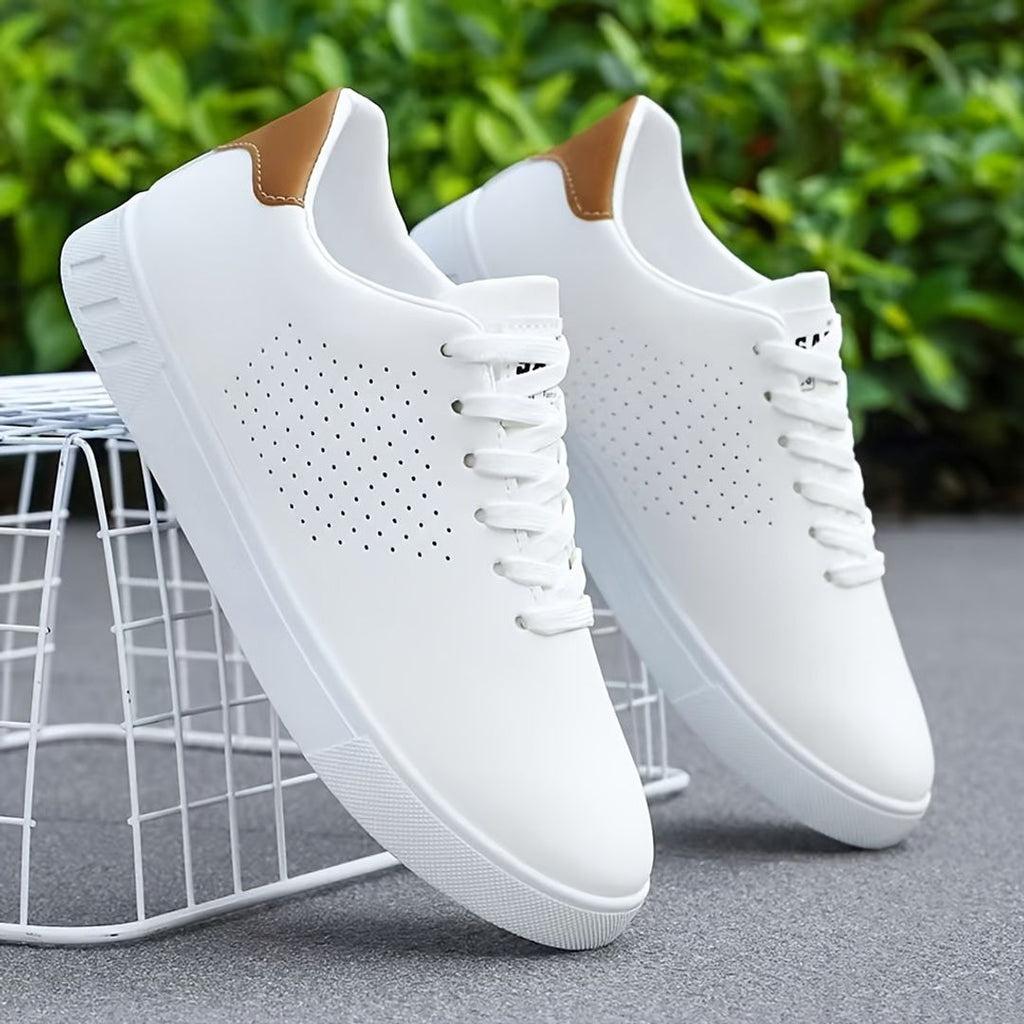 Men's perforated low top sneakers in white, outdoors