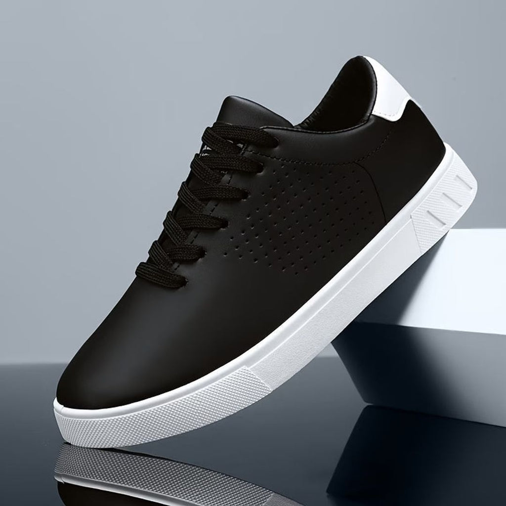 Men's perforated low top sneakers in black, side view