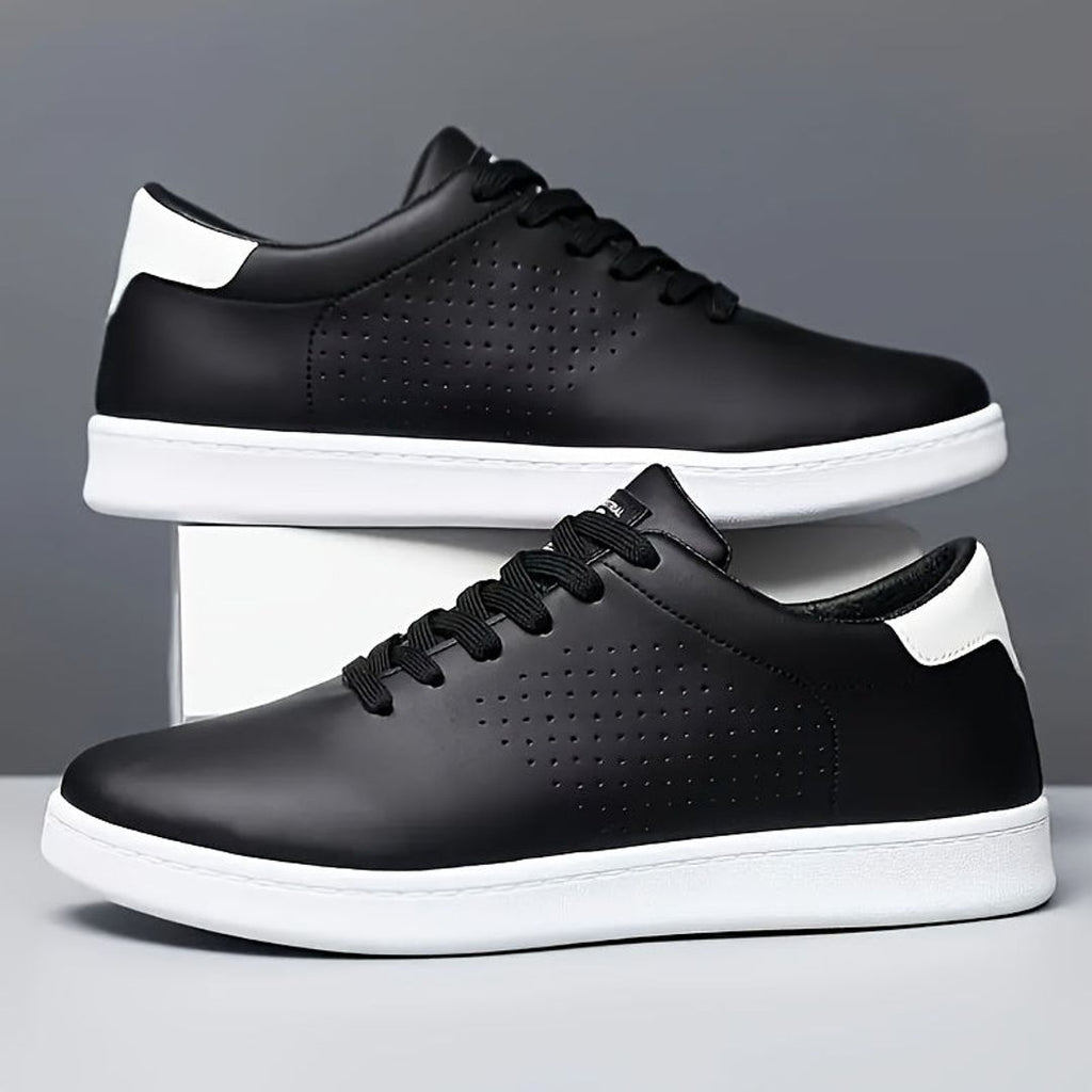 Men's perforated low top sneakers in black, pair view