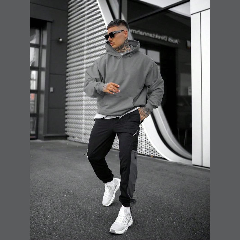 Man wearing the grey hoodie – full length