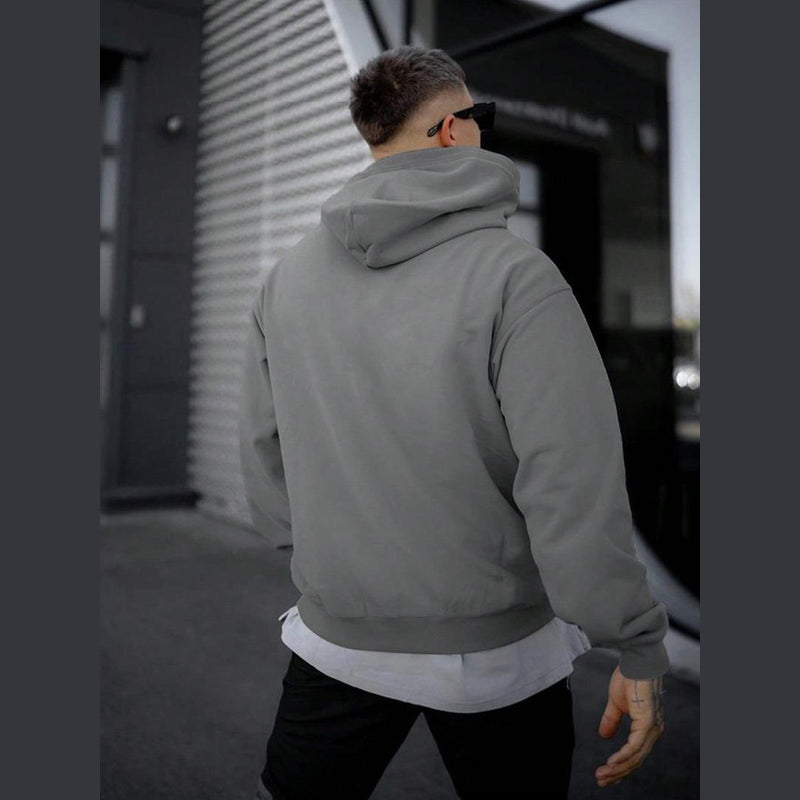 Man wearing the grey hoodie – side view