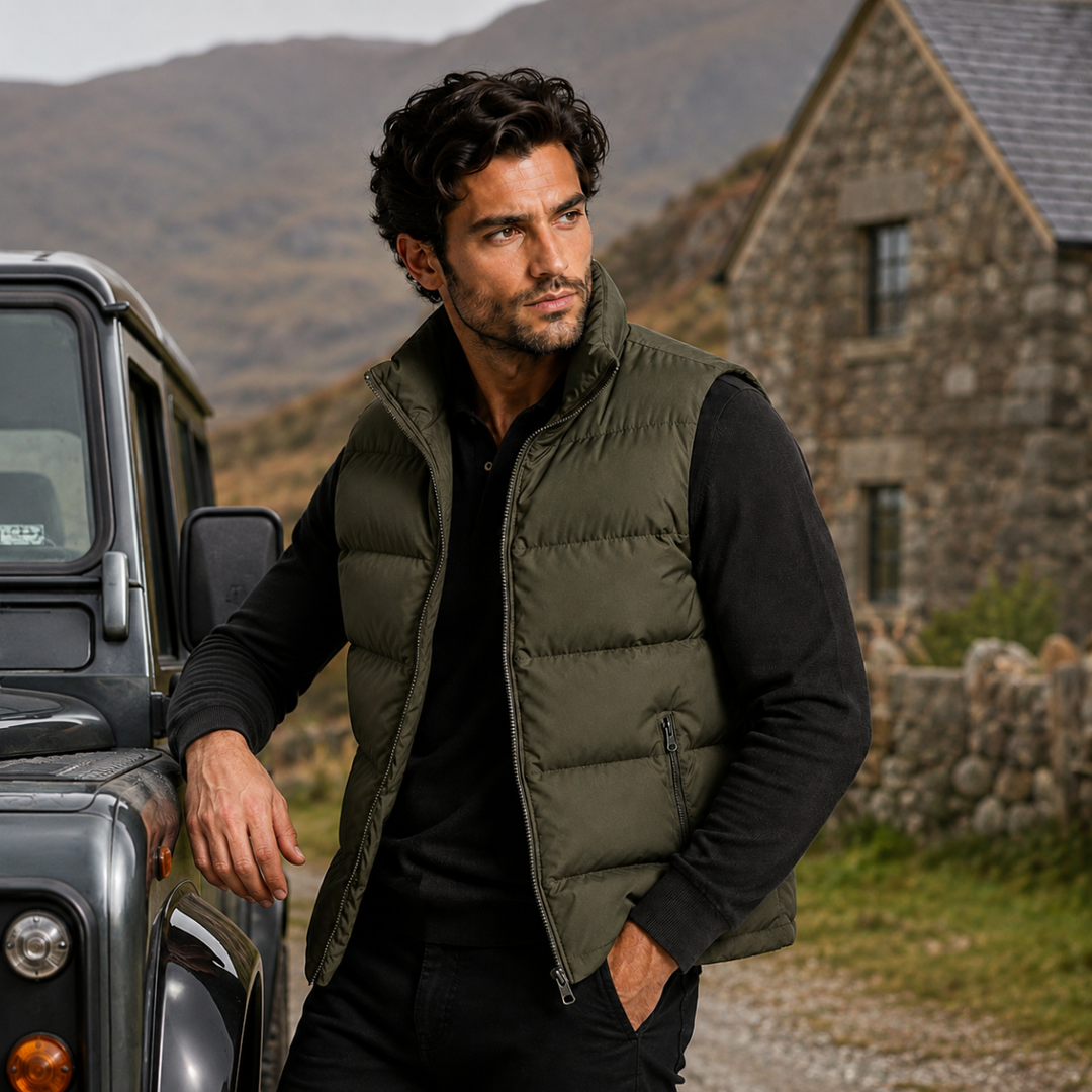 Man wearing an army green gilet outdoors