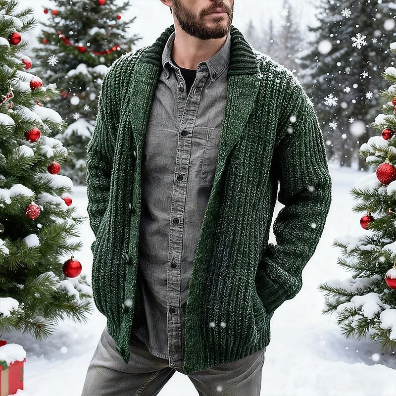 Man wearing the green shawl collar cardigan in the snow