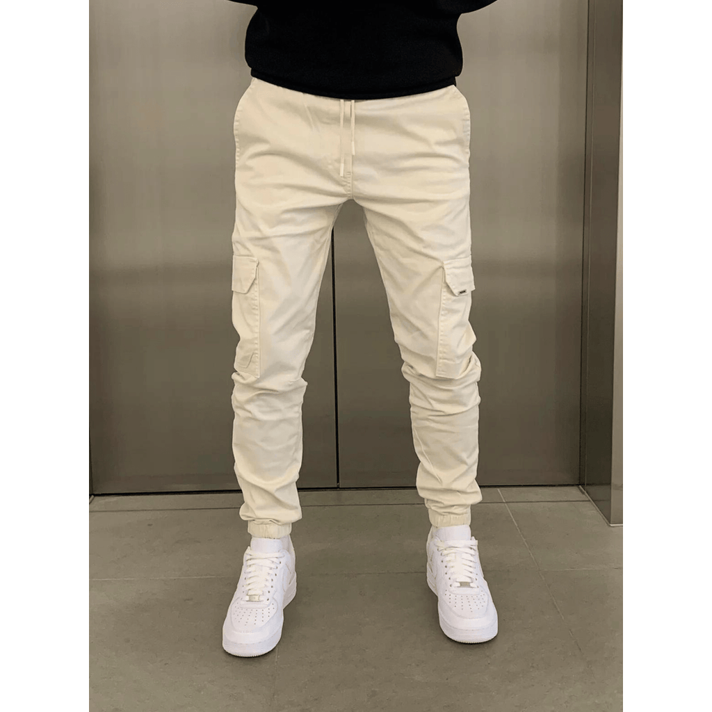 Man wearing beige cargo joggers