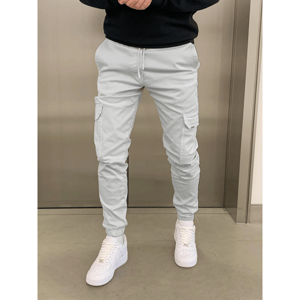 Man wearing light grey cargo joggers