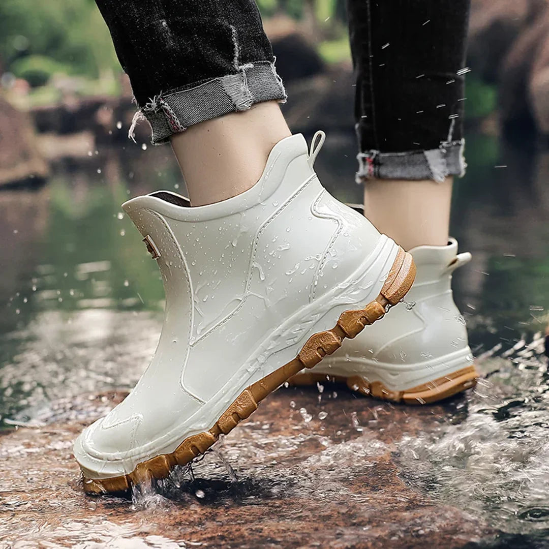 Men's beige rain boots worn outdoors