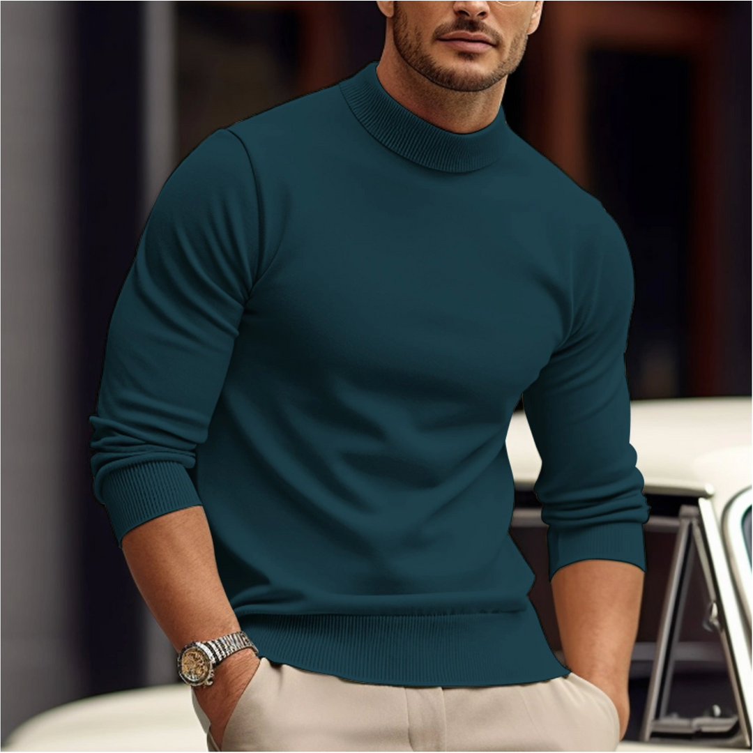 Man wearing a green knit sweater