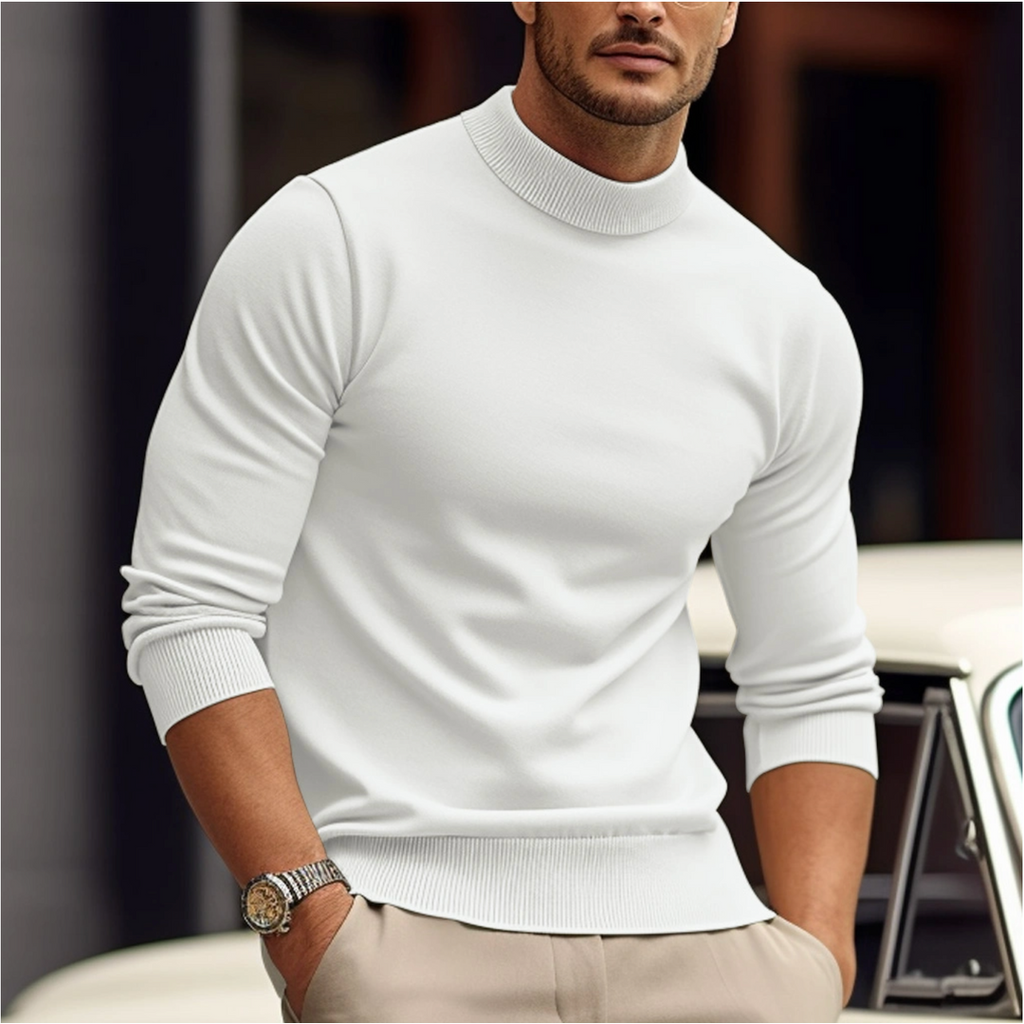 Man wearing a white knit sweater