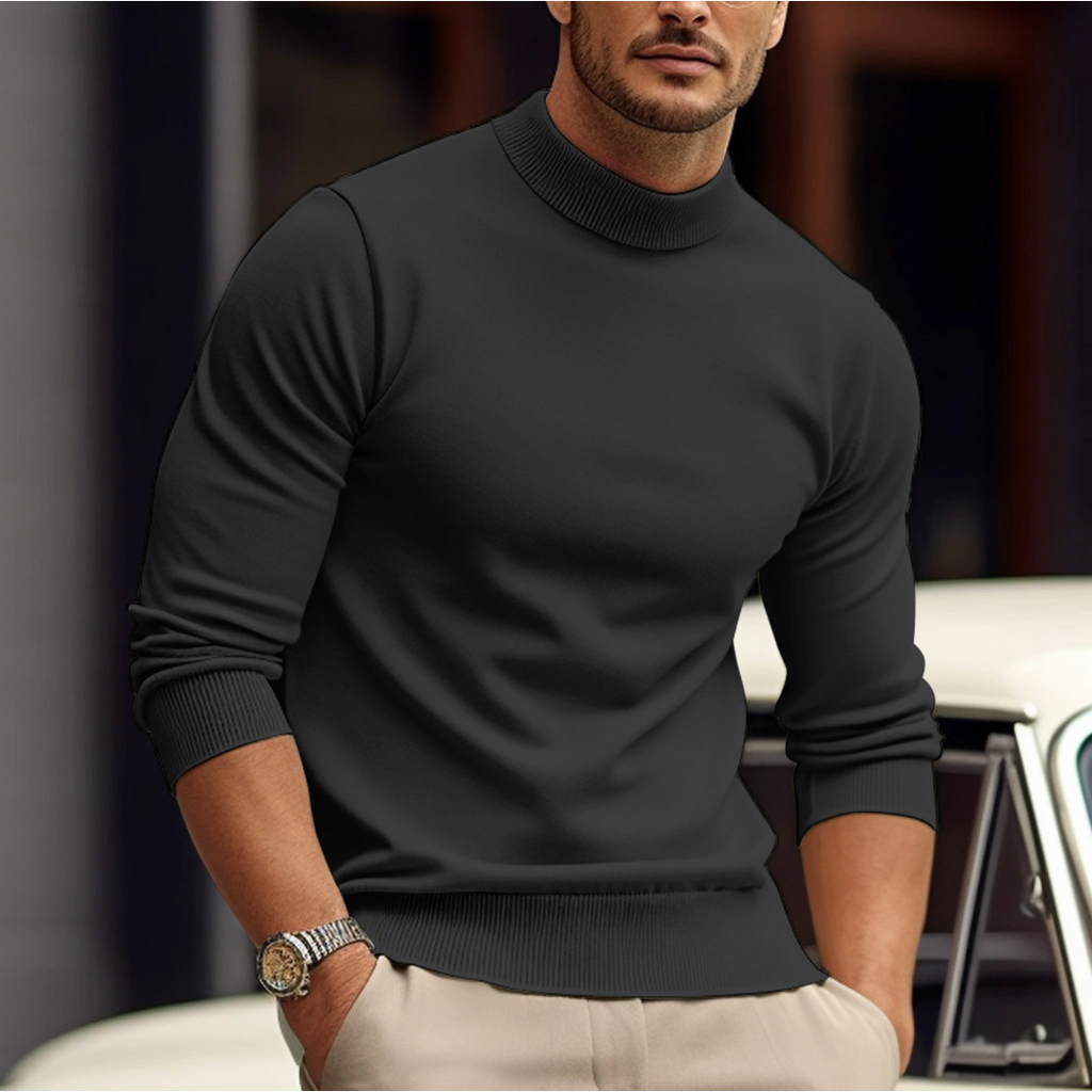Man wearing a dark grey knit sweater