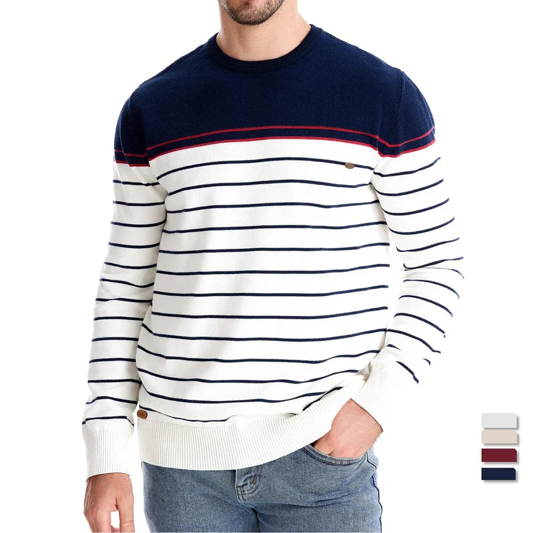 Man wearing a navy and white striped sweater