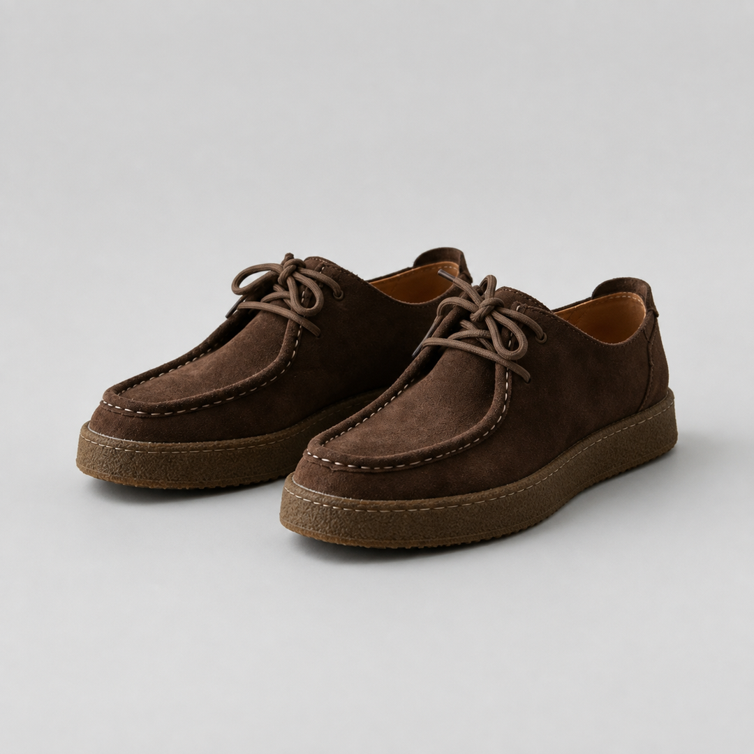 Pair of dark brown moccasin shoes