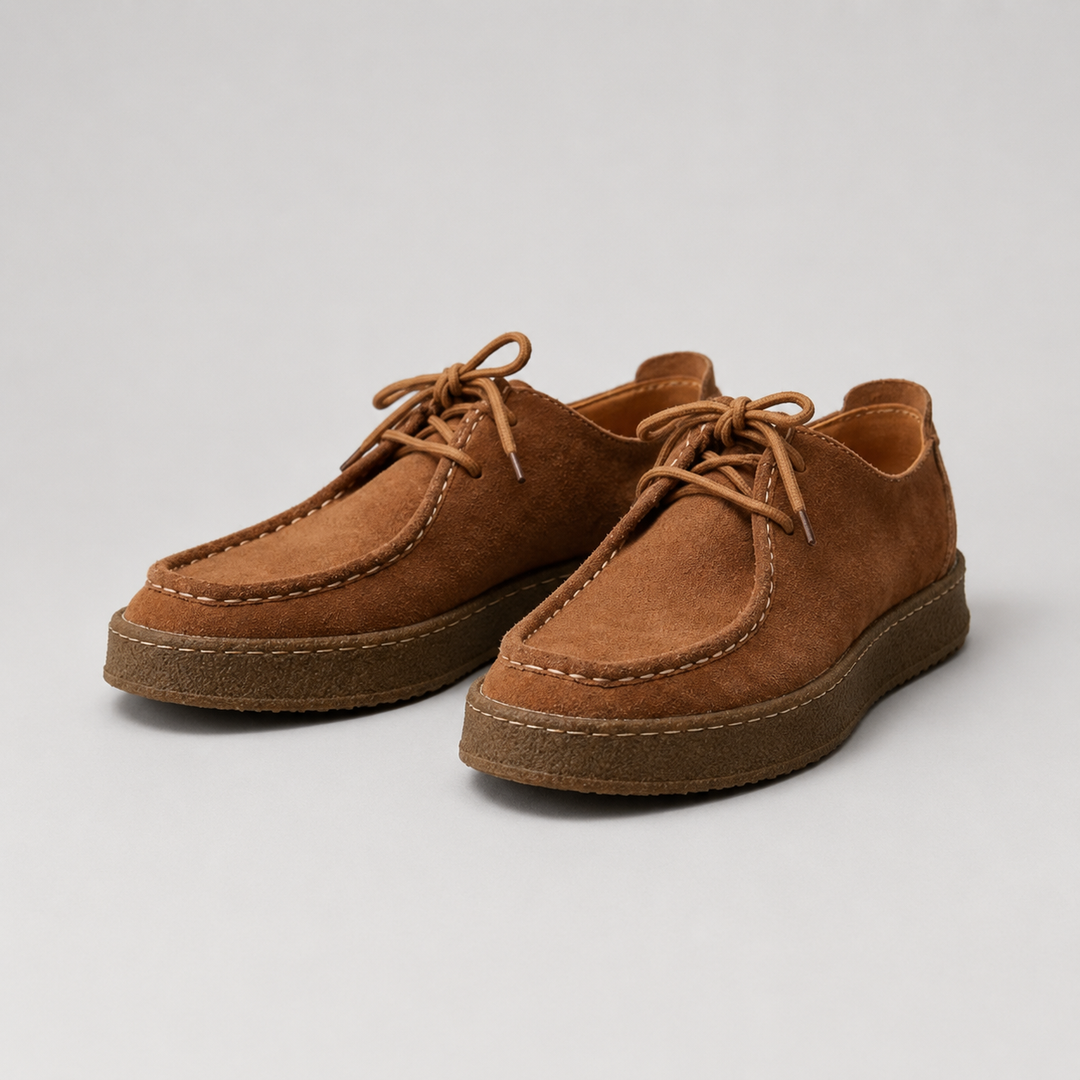 Pair of brown lace-up moccasin shoes