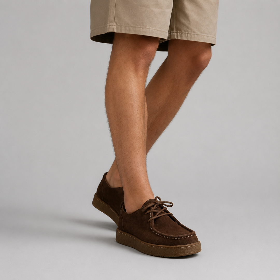 Man wearing dark brown moccasin shoes with shorts
