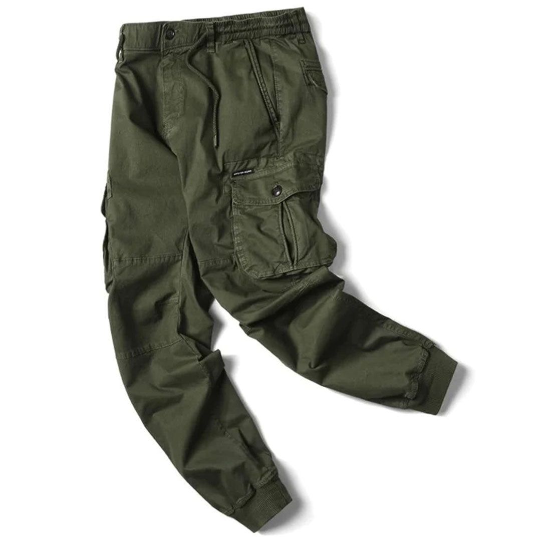 Men's tapered cargo trousers in green, flat lay