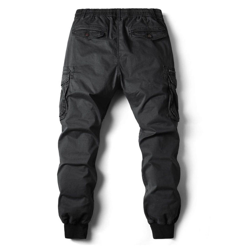 Men's tapered cargo trousers in black, side view