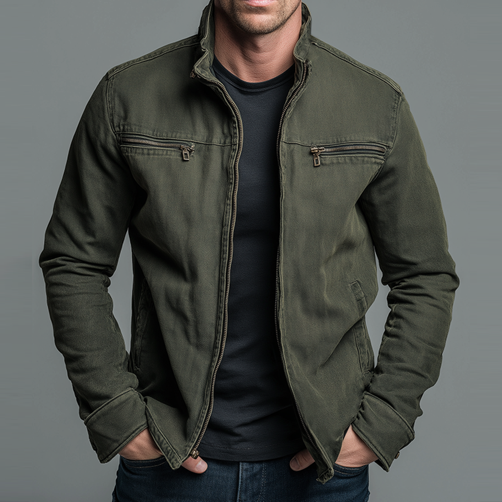 Man wearing a green zip jacket over a black tee