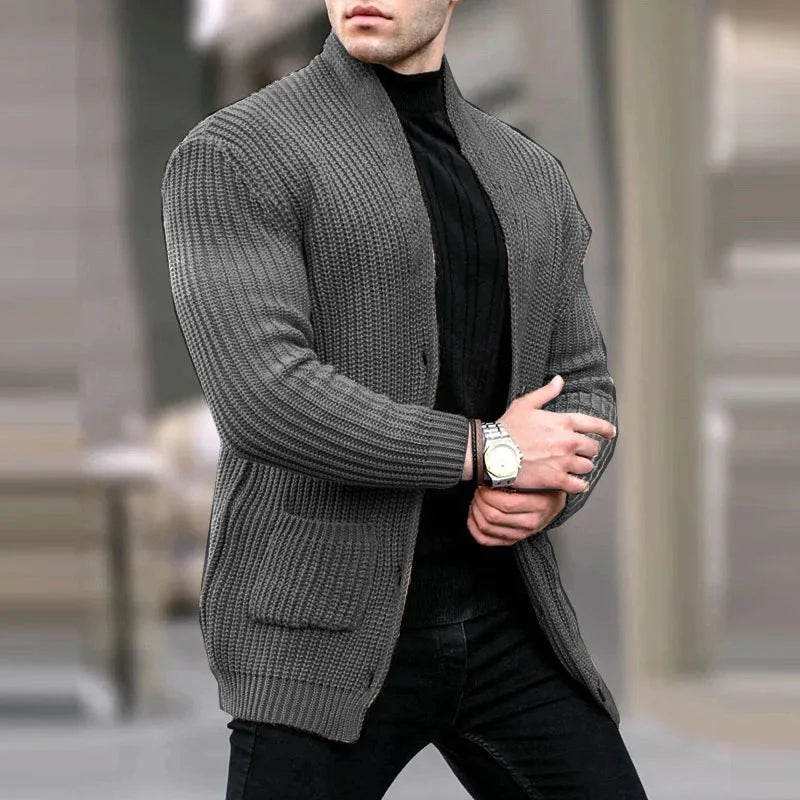 Man wearing dark grey chunky knit cardigan