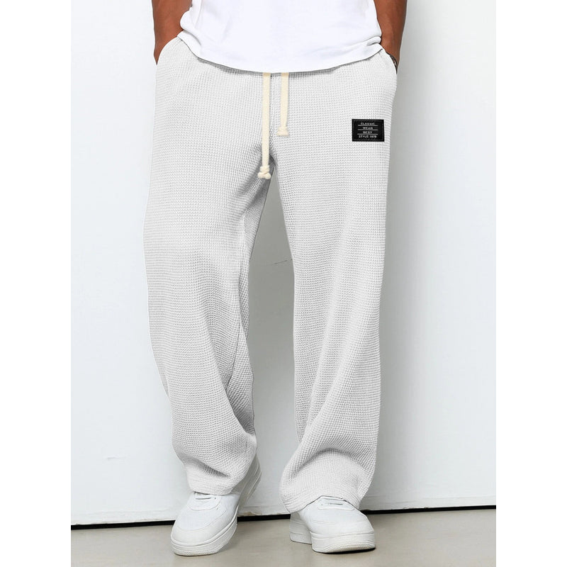 Men's relaxed fit drawstring trousers in white