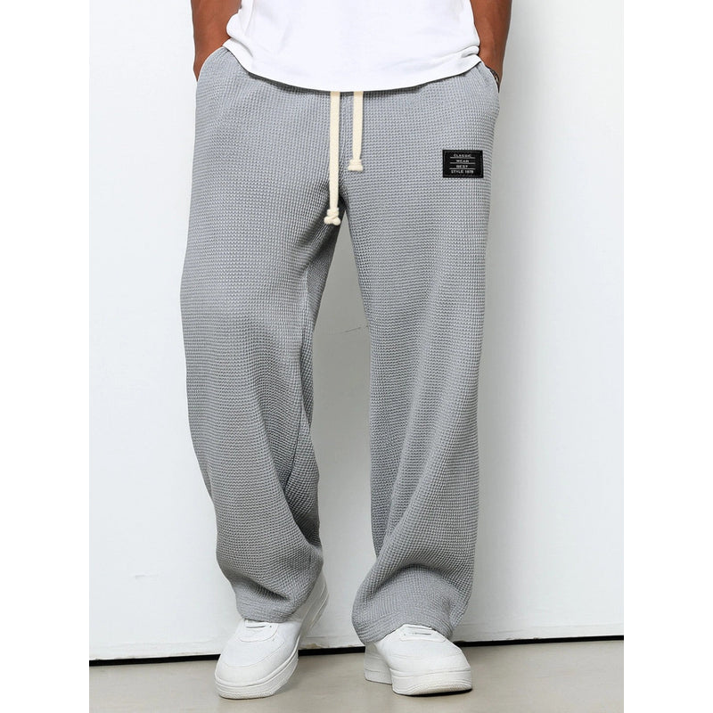 Men's relaxed fit drawstring trousers in grey