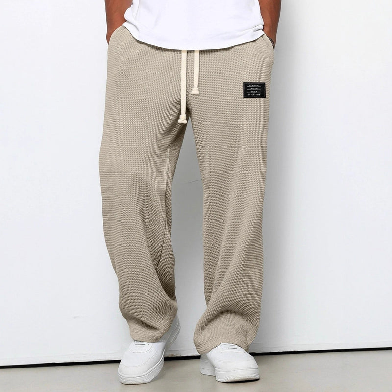 Men's relaxed fit drawstring trousers in khaki