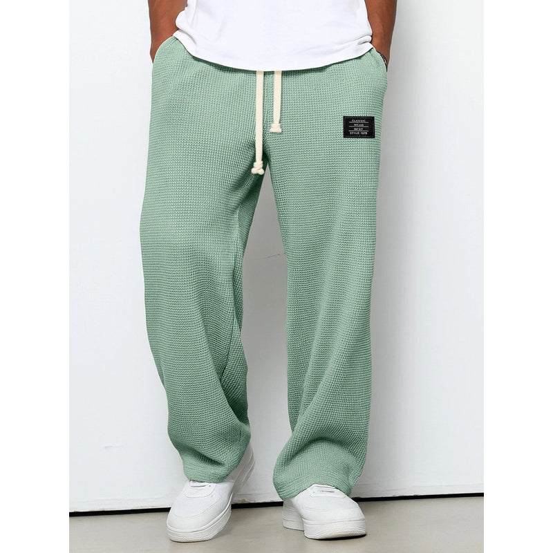 Men's relaxed fit drawstring trousers in green