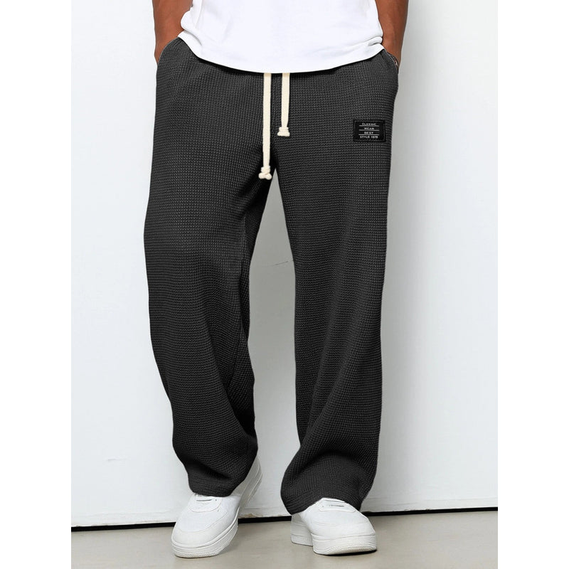 Men's relaxed fit drawstring trousers in black