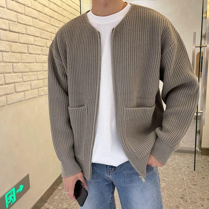 Man wearing khaki ribbed zip-up cardigan
