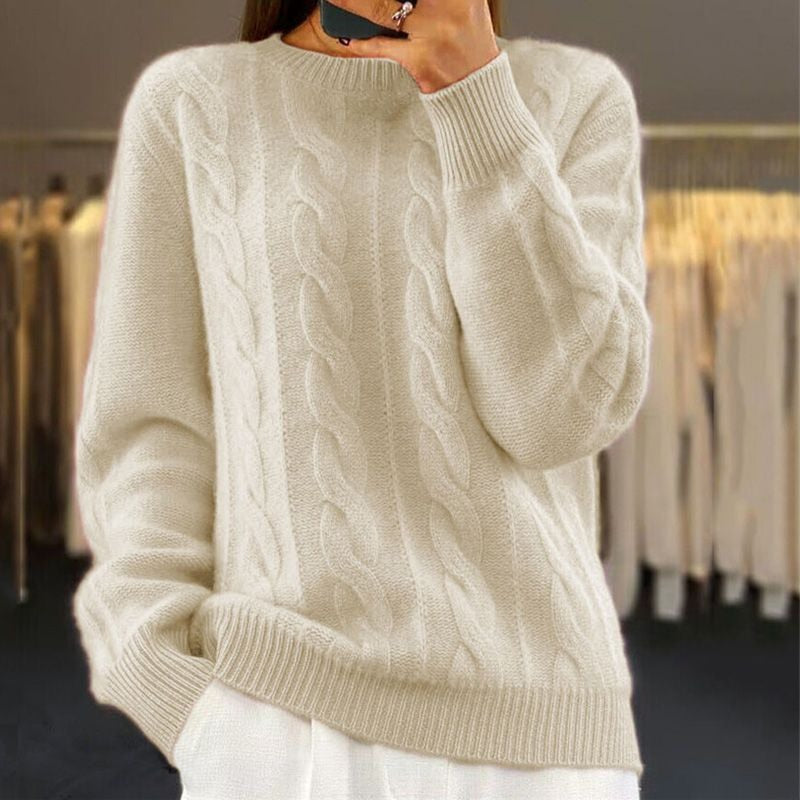 Women's cable knit crew neck sweater in cream