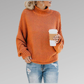 Women's chunky knit turtleneck sweater with relaxed fit in orange