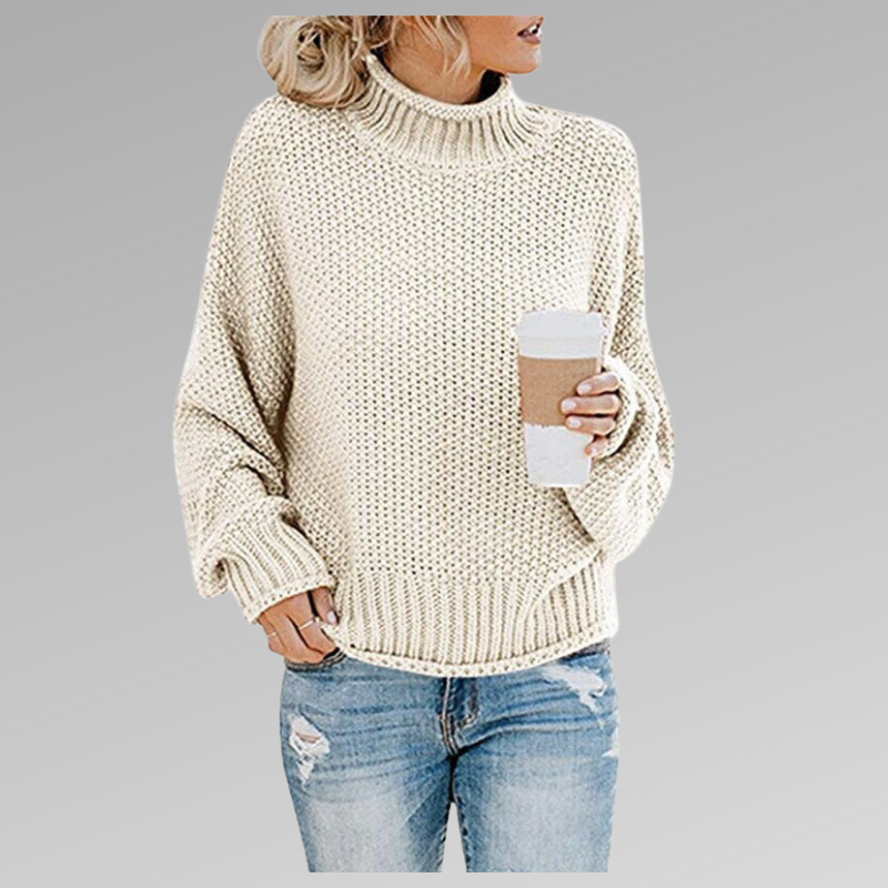 Women's chunky knit turtleneck sweater with relaxed fit in white