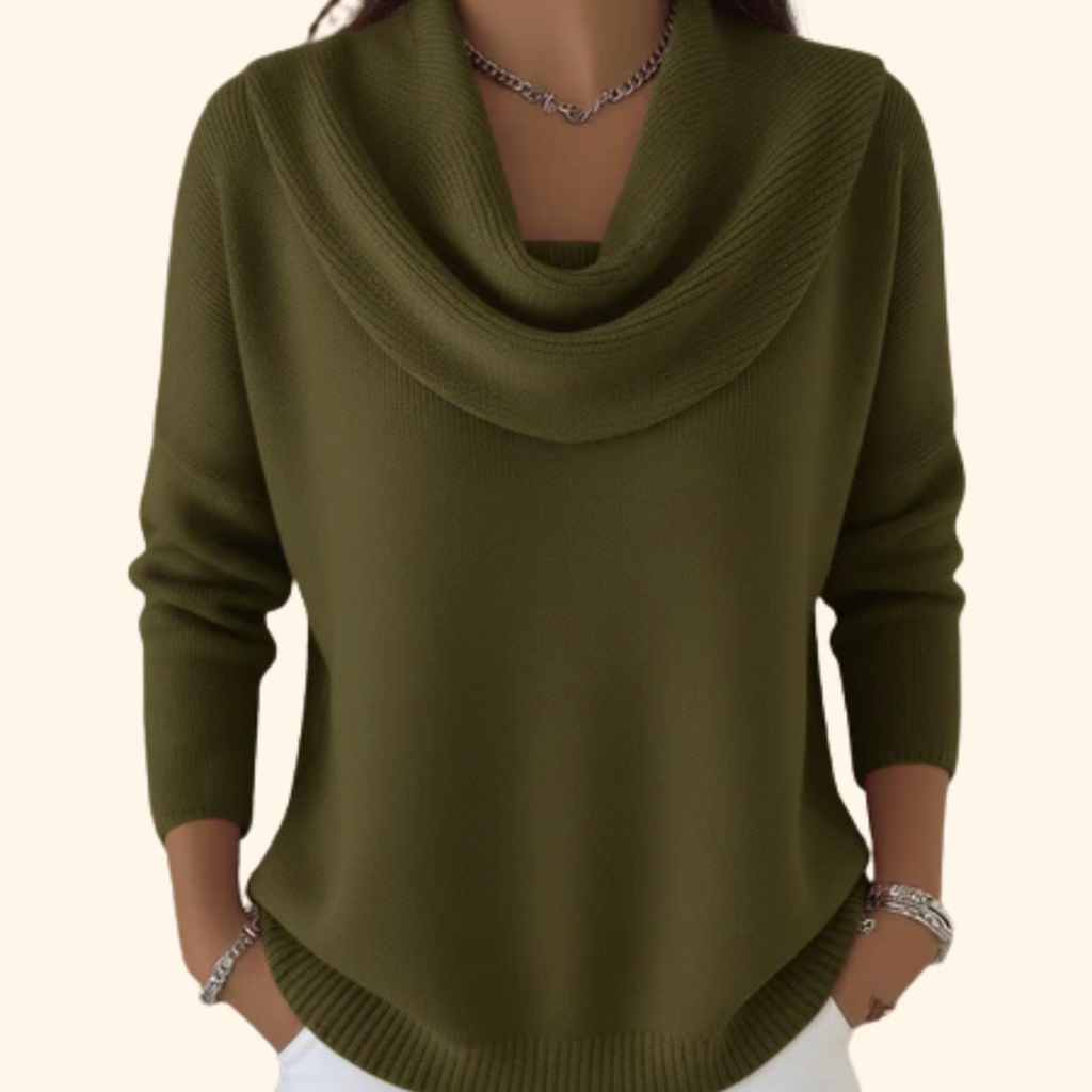 Woman wearing a green relaxed cowl neck sweater