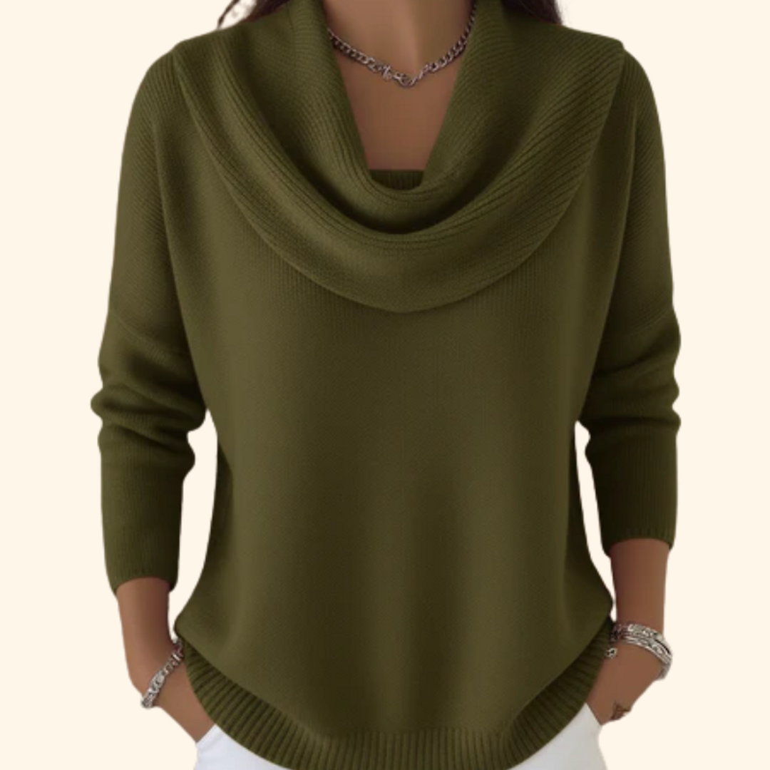 Woman wearing a green relaxed cowl neck sweater