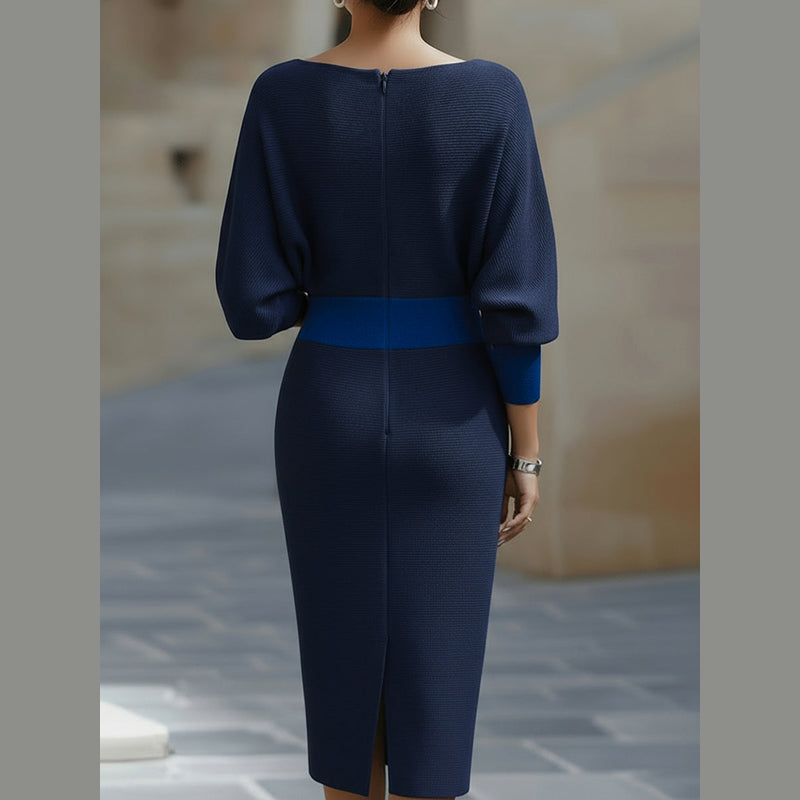 Woman wearing the navy blue draped midi dress – front view